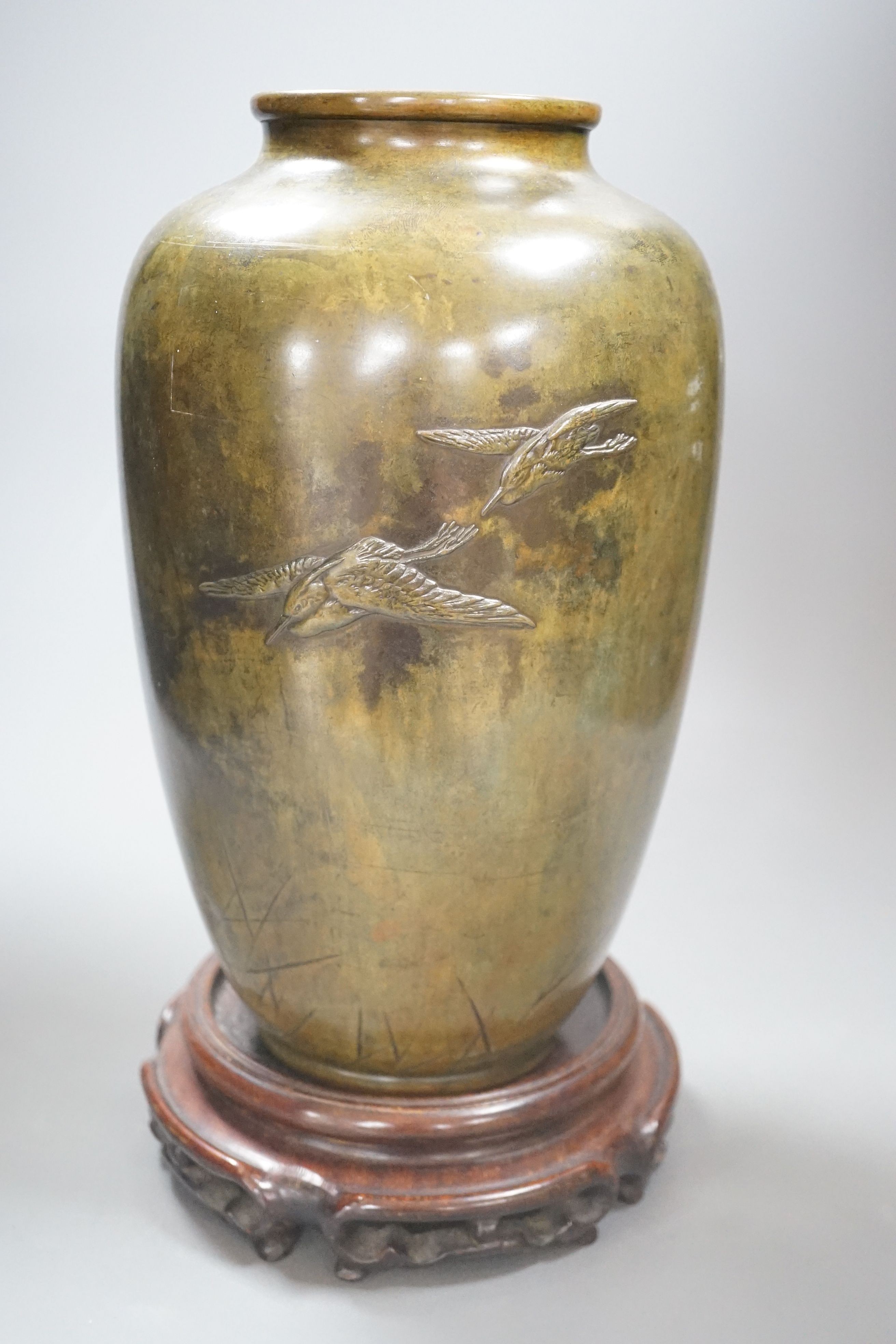 A Japanese Meiji period bronze vase, wood stand - 35cm tall